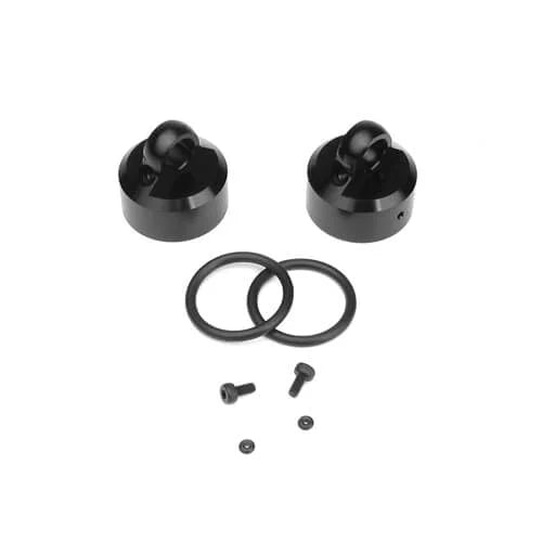 TKR8702 – Shock Caps (7075, emulsion/vented/standard, black ano, 2pcs)